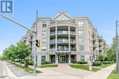 211 - 180 John West Way, Aurora, ON - Outdoor With Balcony With Facade