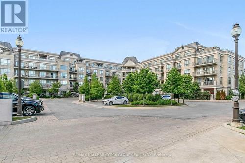 211 - 180 John West Way, Aurora, ON - Outdoor With Balcony With Facade