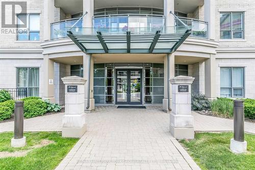 211 - 180 John West Way, Aurora, ON - Outdoor With Balcony With Facade