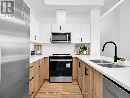 102 - 1076 Gainsborough Road, London, ON - Indoor Photo Showing Kitchen With Double Sink