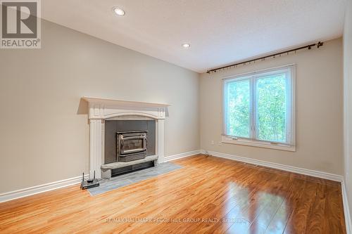 22 Macmillan Crescent, Barrie, ON - Indoor Photo Showing Living Room With Fireplace