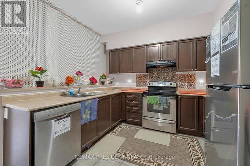 103 Cedar Lake Crescent S, Brampton, ON - Indoor Photo Showing Kitchen With Double Sink