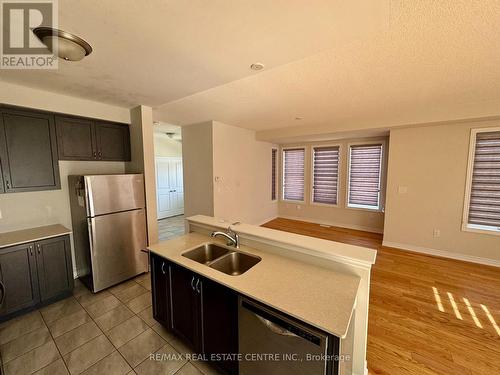 17 Bushwood Trail, Brampton, ON - Indoor Photo Showing Kitchen With Double Sink