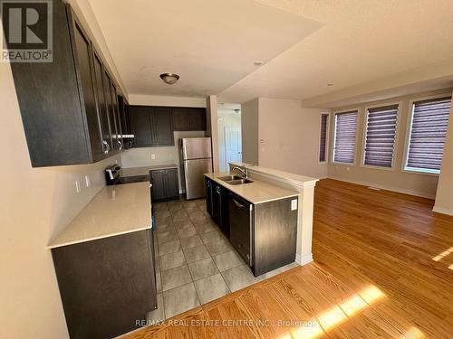 17 Bushwood Trail, Brampton, ON - Indoor Photo Showing Kitchen With Double Sink