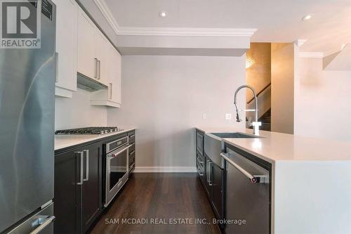 4 - 4030 Parkside Village Drive, Mississauga, ON - Indoor Photo Showing Kitchen With Stainless Steel Kitchen With Upgraded Kitchen