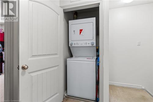 Upper-Level Stacked Washer Dryer - 535 Margaret Street Unit# 48, Cambridge, ON - Indoor Photo Showing Laundry Room