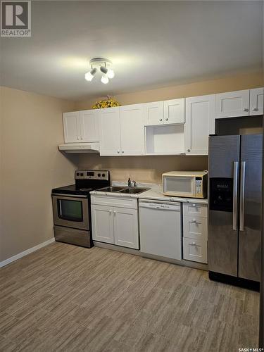 760 Rae Street, Regina, SK - Indoor Photo Showing Kitchen With Double Sink