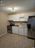 760 Rae Street, Regina, SK  - Indoor Photo Showing Kitchen With Double Sink 