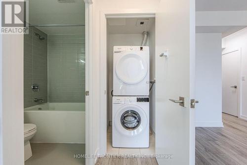 2310 - 159 Wellesley Street E, Toronto, ON - Indoor Photo Showing Laundry Room