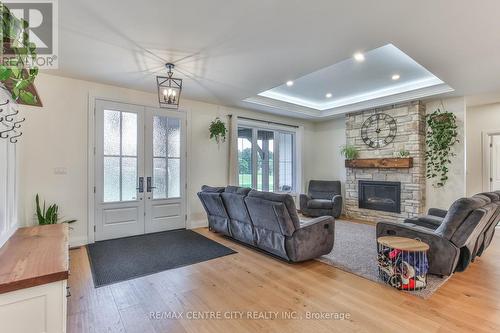 14 St Ladislaus Street, Norfolk (Courtland), ON - Indoor Photo Showing Living Room With Fireplace