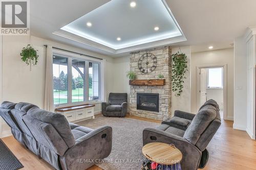 14 St Ladislaus Street, Norfolk (Courtland), ON - Indoor Photo Showing Living Room With Fireplace