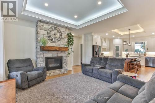 14 St Ladislaus Street, Norfolk (Courtland), ON - Indoor Photo Showing Living Room With Fireplace