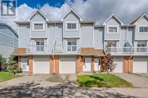 23 - 111 Traynor Avenue, Kitchener, ON - Outdoor With Balcony With Facade