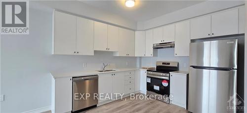 412 - 397 Codds Road, Ottawa, ON - Indoor Photo Showing Kitchen With Double Sink