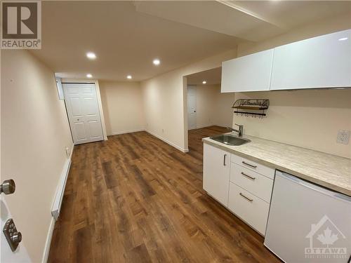 Lower level Rec. + Kitchenette - 211 Mcgillivray Street, Ottawa, ON - Indoor Photo Showing Kitchen