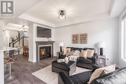 627 Monardia Way, Ottawa, ON - Indoor Photo Showing Living Room With Fireplace