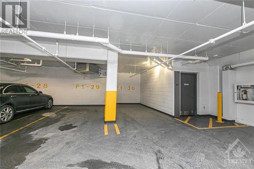 320 Miwate Private Unit#107, Ottawa, ON - Indoor Photo Showing Garage