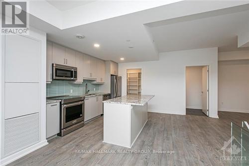 107 - 320 Miwate, Ottawa, ON - Indoor Photo Showing Kitchen With Upgraded Kitchen