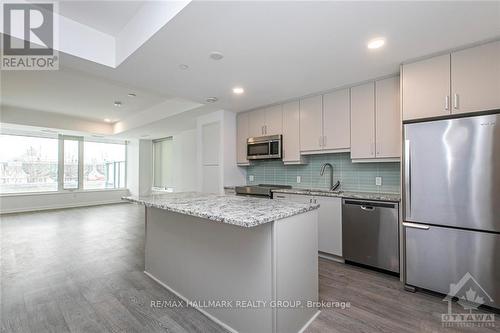 107 - 320 Miwate, Ottawa, ON - Indoor Photo Showing Kitchen With Upgraded Kitchen