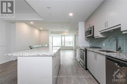 107 - 320 Miwate, Ottawa, ON - Indoor Photo Showing Kitchen With Upgraded Kitchen