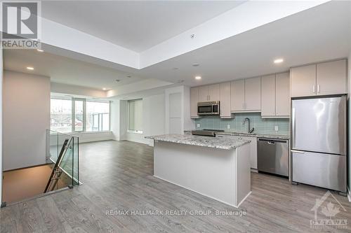 107 - 320 Miwate, Ottawa, ON - Indoor Photo Showing Kitchen With Upgraded Kitchen