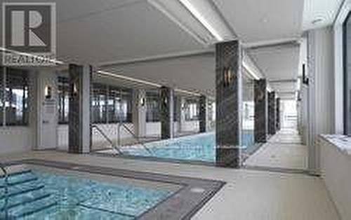 320 - 20 Shore Breeze Drive, Toronto, ON -  With In Ground Pool