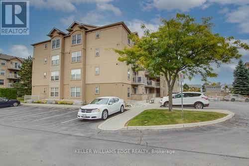 312 - 1810 Walker'S Line, Burlington, ON - Outdoor With Balcony With Facade