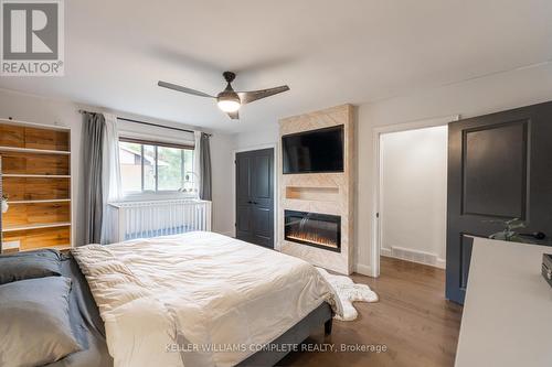 2 Brentwood Road, Grimsby, ON - Indoor Photo Showing Bedroom With Fireplace