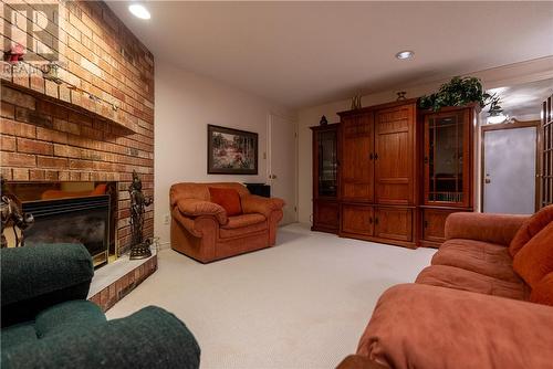 302 Moonrock Avenue, Sudbury, ON - Indoor Photo Showing Living Room With Fireplace