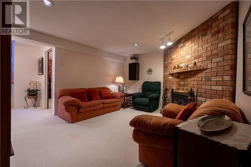 302 Moonrock Avenue, Sudbury, ON - Indoor Photo Showing Living Room With Fireplace