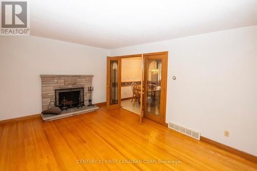 17 Stormont Drive, London, ON - Indoor Photo Showing Living Room With Fireplace