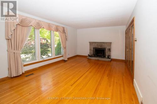 17 Stormont Drive, London, ON - Indoor Photo Showing Living Room With Fireplace