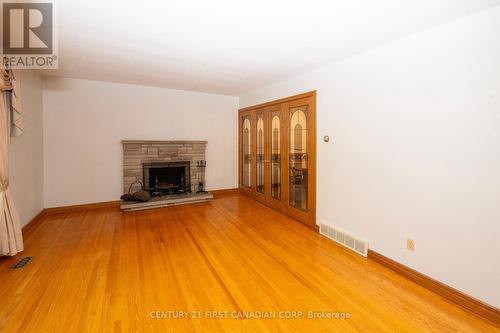 17 Stormont Drive, London, ON - Indoor Photo Showing Living Room With Fireplace