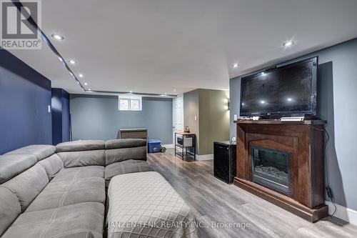 49965 Dingle Street, Malahide, ON - Indoor Photo Showing Living Room With Fireplace