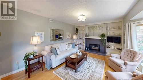 21 Melanie Drive, Quispamsis, NB - Indoor Photo Showing Living Room With Fireplace