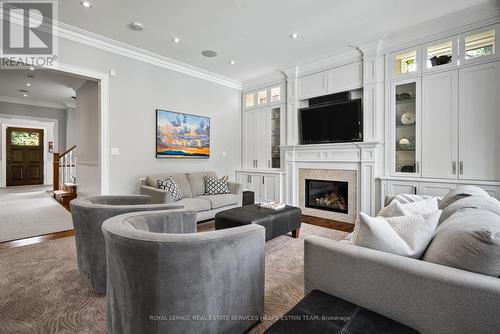 4 Evergreen Gardens, Toronto, ON - Indoor Photo Showing Living Room With Fireplace