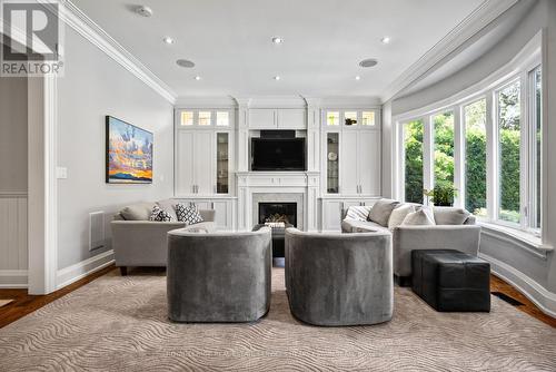 4 Evergreen Gardens, Toronto, ON - Indoor Photo Showing Living Room With Fireplace