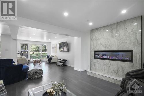 3368 Baskins Beach Road, Dunrobin, ON - Indoor Photo Showing Other Room With Fireplace