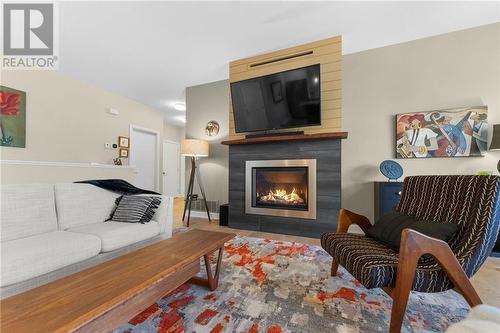 494 County 43 Road, Merrickville, ON - Indoor Photo Showing Living Room With Fireplace