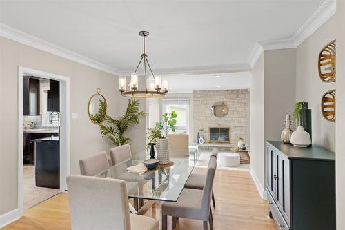 637 Waterloo Street, Winnipeg, MB - Indoor Photo Showing Dining Room With Fireplace