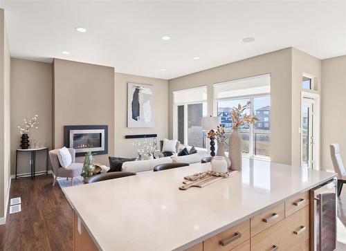 10 Sundog Drive, Winnipeg, MB - Indoor Photo Showing Living Room With Fireplace