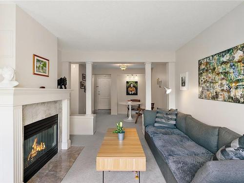 305-1501 Richmond Ave, Victoria, BC - Indoor Photo Showing Living Room With Fireplace