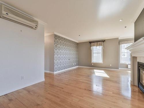 Overall view - 303-125 Rue D'Angoulême, Sainte-Julie, QC - Indoor Photo Showing Other Room With Fireplace