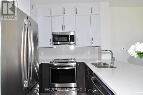 633 - 1105 Leger Way, Milton, ON - Indoor Photo Showing Kitchen With Stainless Steel Kitchen With Double Sink With Upgraded Kitchen