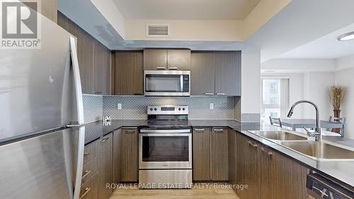 1509 - 2152 Lawrence Avenue E, Toronto, ON - Indoor Photo Showing Kitchen With Stainless Steel Kitchen With Double Sink With Upgraded Kitchen