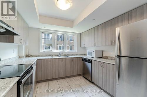 27 Filly Path, Oshawa, ON - Indoor Photo Showing Kitchen With Stainless Steel Kitchen With Double Sink