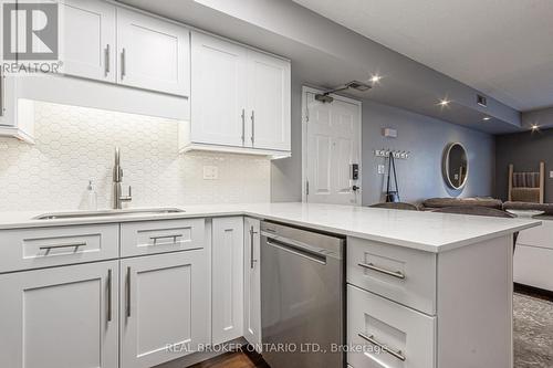 103 - 2010 Cleaver Avenue, Burlington, ON - Indoor Photo Showing Kitchen With Upgraded Kitchen