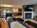 2290 Park Avenue, Lumby, BC  - Indoor Photo Showing Living Room With Fireplace 