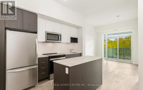 301 - 202 Burnhamthorpe Road E, Mississauga, ON - Indoor Photo Showing Kitchen With Stainless Steel Kitchen