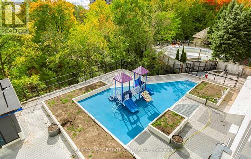 301 - 202 Burnhamthorpe Road E, Mississauga, ON - Outdoor With In Ground Pool